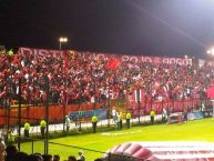 Foto: Barra: Disturbio Rojo Bogotá • Club: América de Cáli