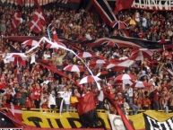 Foto: Barra: Disturbio Rojo Bogotá • Club: América de Cáli