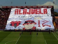 Foto: "No estamos por momentos, estamos para siempre" Barra: La 12 • Club: Alajuelense • País: Costa Rica